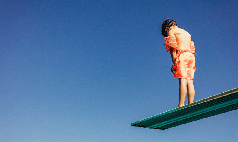 Boy on a diving board | Jacob Lund - stock.adobe.com