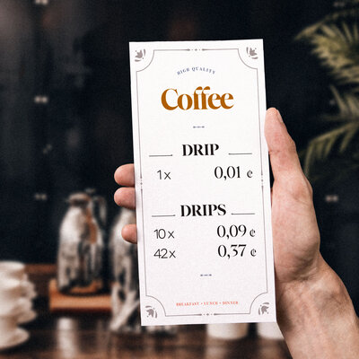 A menu from a coffee bar. One drip of coffee for 0,01ct. 10 drips for 0,09ct.